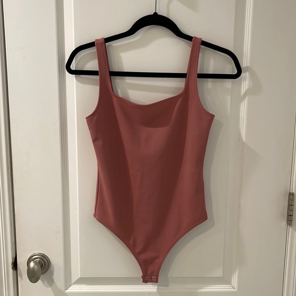 Express body suit in rose, size XS
